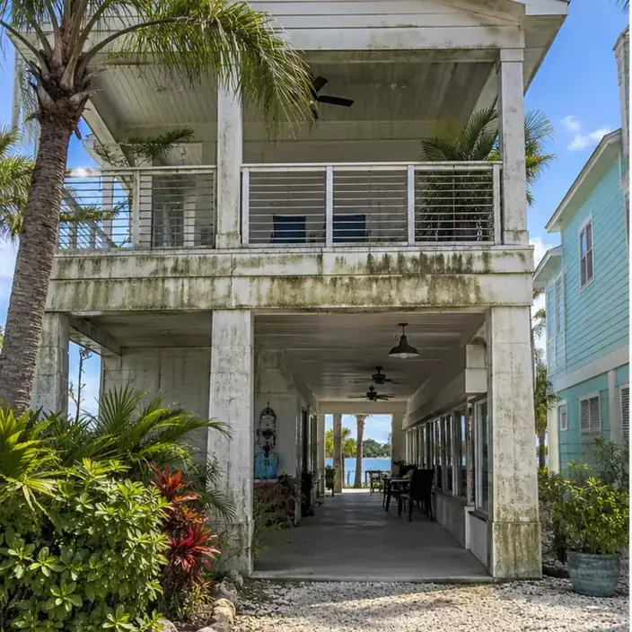 Before cleaning: before and after photos of a Bradenton Beach rebuilt home and storefront
