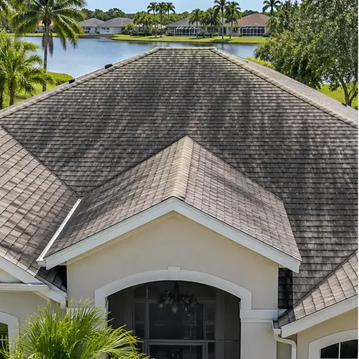 Before cleaning: before and after photos of shingle roofs