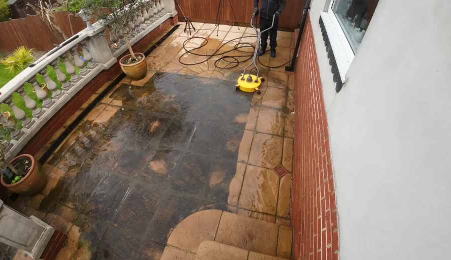 Concrete patio cleaning removing mold algae and stains in Bradenton FL backyard