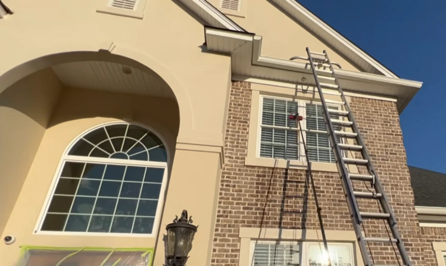 Exterior window cleaning removing dirt and hard water stains on Florida home in Bradenton