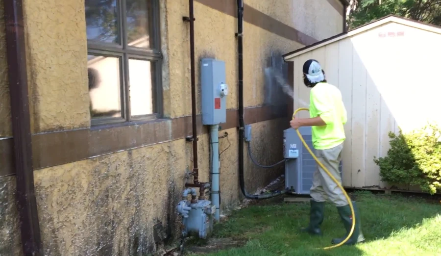pressure cleaning property exterior near Palma Sola Bay in Florida