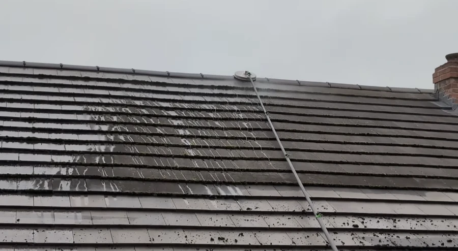 Low-pressure soft wash roof cleaning safe for asphalt shingles in Bradenton FL